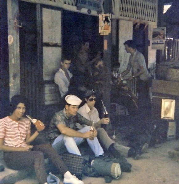  ( Day trip from S'Pore to Malaya 1970 ) SEATED : Heather Caulfield, Jerry Caulfield, Cheryl French. BACKGROUND :  John Pepino (seated) and Brian Ashcroft (standing). 