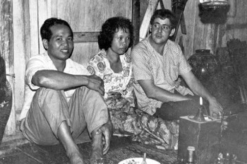  Mick Roberts FIO Padaan chatting (or watching the World Cup Final ?) with the locals at Kampong Sadir in 1966. 