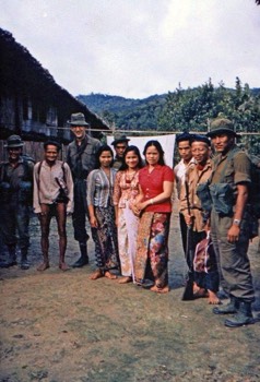  FIO Bario, Paul Devoti, and a patrol from 2/6 GR visiting some local Kelabits 1965. 